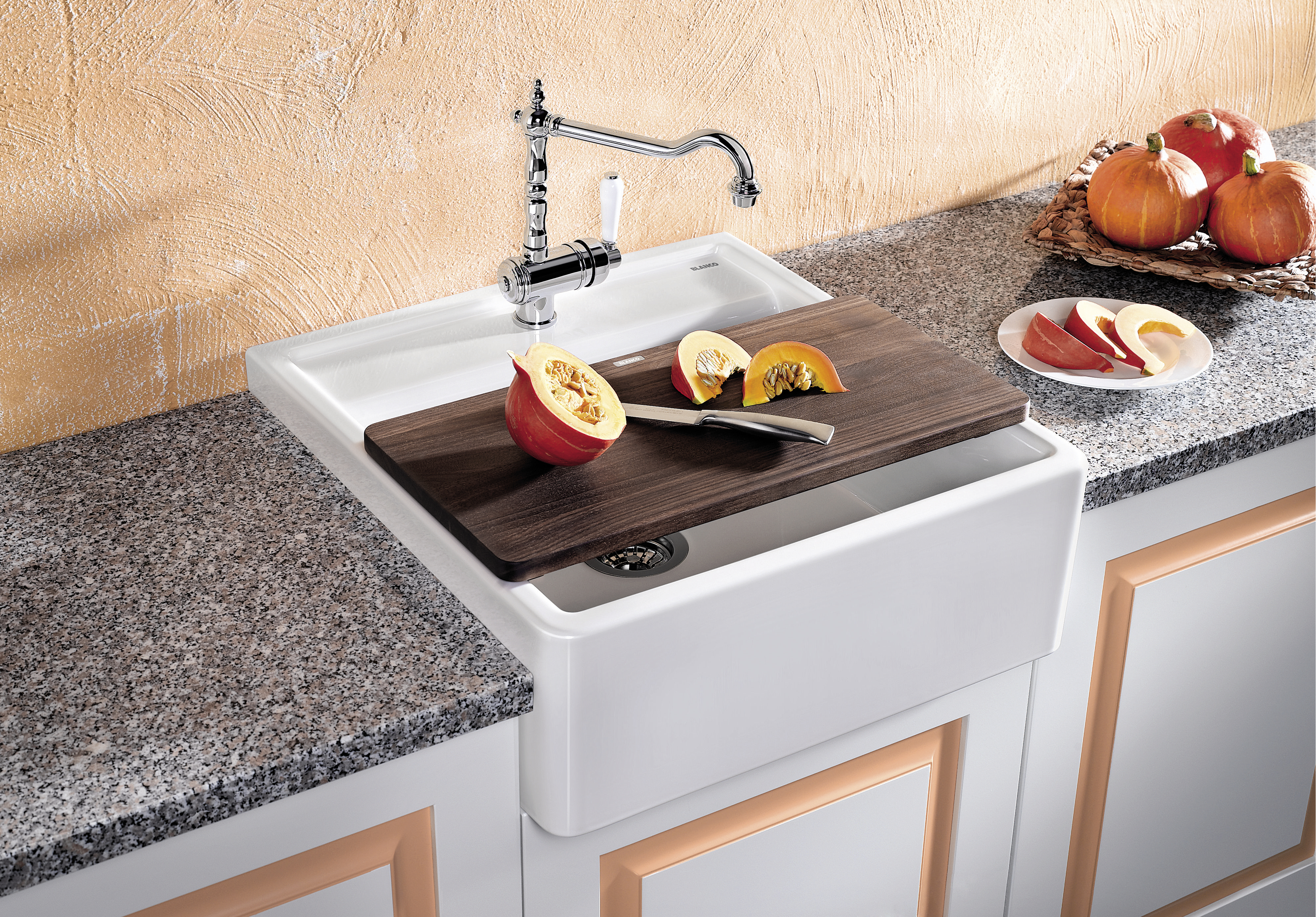 Placing the cutting board over the bowl transforms the sink into a worktop.